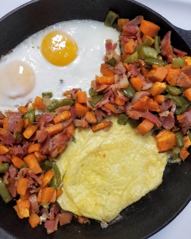 Sweet Potato Hash with Over Medium and Scrambled Eggs In Cast Iron Skillet